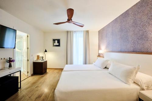 Habitación Superior Attic del hotel H10 Racó del Pi Boutique Hotel. Foto 4