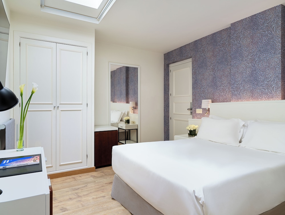 Habitación doble Atico 2 Camas individuales 1 Cama doble del hotel H10 Racó del Pi Boutique Hotel