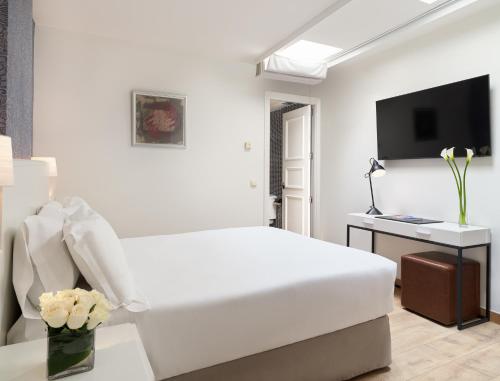 Habitación Attic del hotel H10 Racó del Pi Boutique Hotel. Foto 1