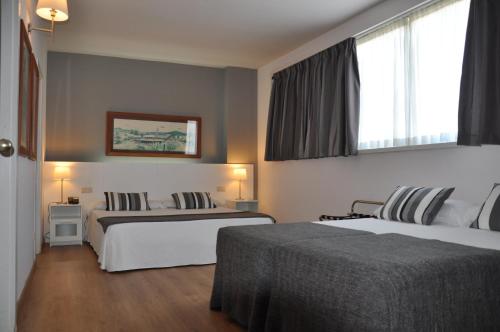 Habitación cuádruple del hotel Atenea Barcelona