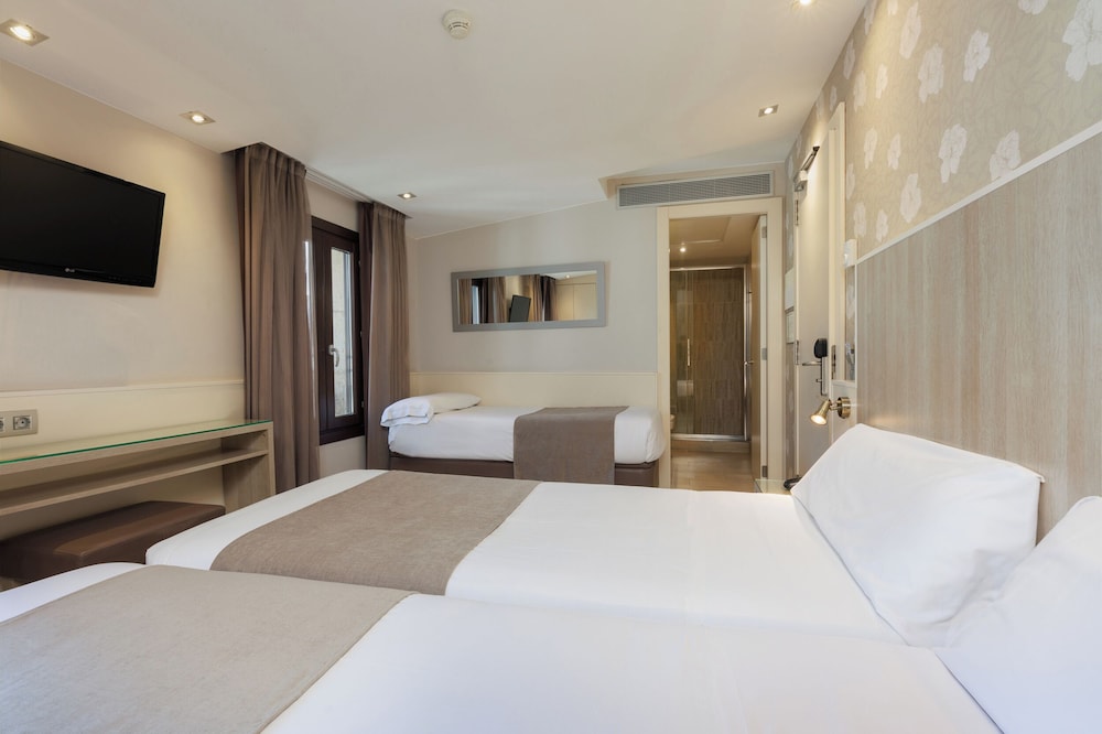 Habitación Triple del hotel Santa Marta. Foto 4