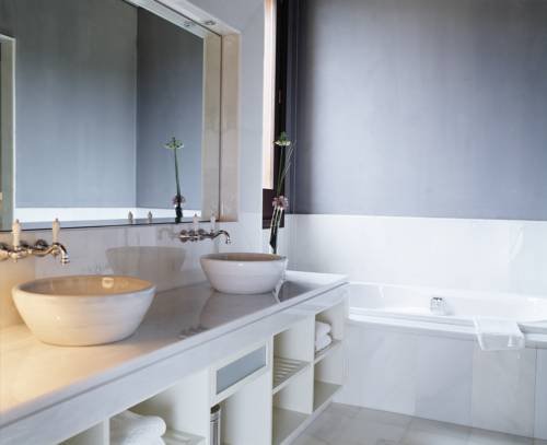 Habitación con Terraza Vista Ciudad dos camas separadas del hotel Gran Hotel la Florida