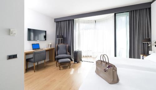 Suite Junior Familiar del hotel Guitart Grand Passage. Foto 2