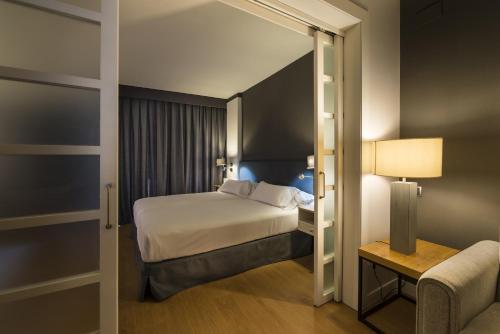 Junior suite Vista ciudad Familiar del hotel Guitart Grand Passage. Foto 3