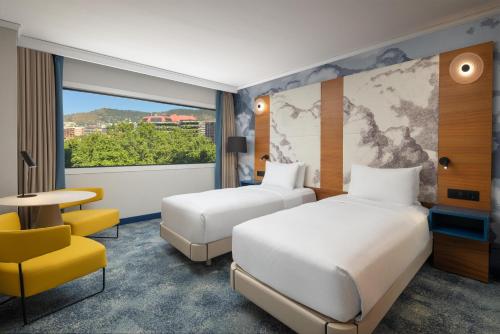 Habitación Doble - 2 camas del hotel Hilton Barcelona. Foto 8