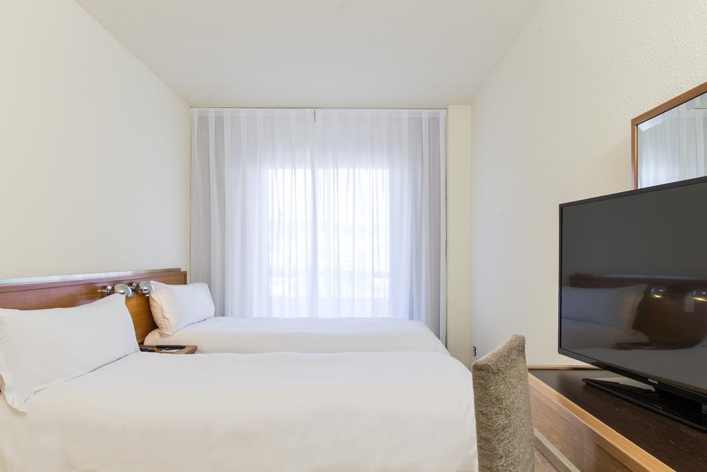 Habitación doble 2 camas del hotel Moxy Barcelona