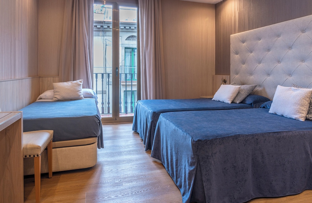 Habitación Triple del hotel Rialto. Foto 4