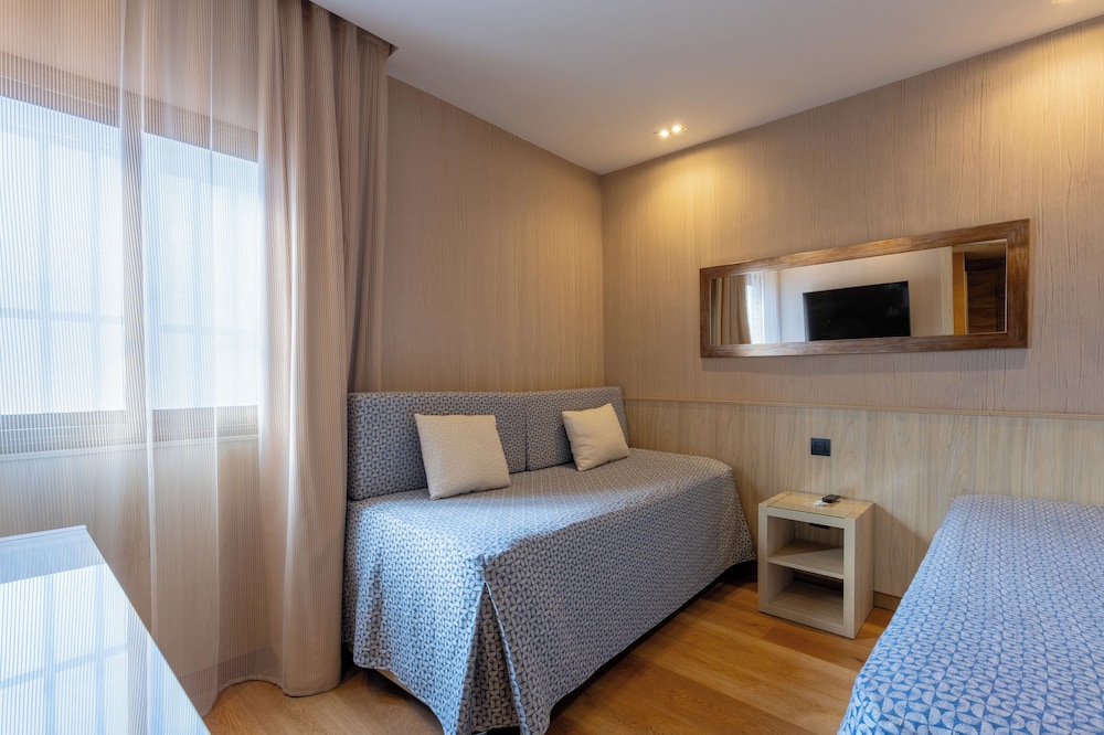 Habitación Cuádruple del hotel Rialto. Foto 10