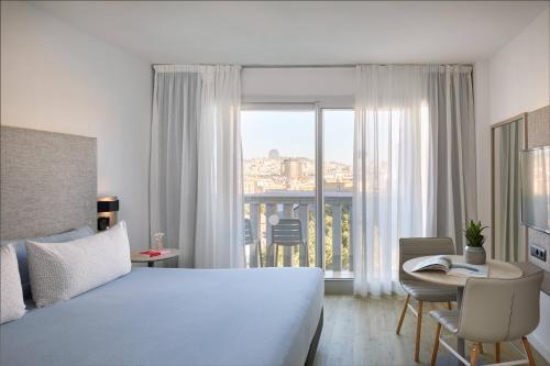 Casa Unifamiliar y Estudio comunicados con balcón y vistas a la ciudad del hotel INNSiDE Barcelona Apolo. Foto 2