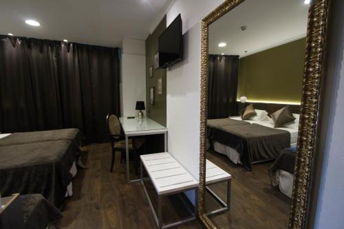 Habitación Triple del hotel Moderno Barcelona