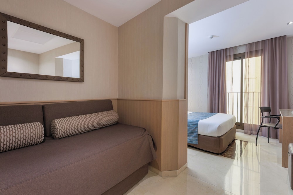 Habitación Triple del hotel Gotico. Foto 2