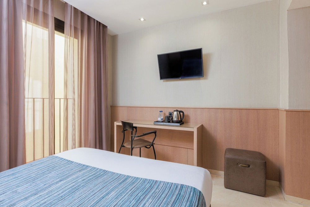 Habitación Triple del hotel Gotico. Foto 5