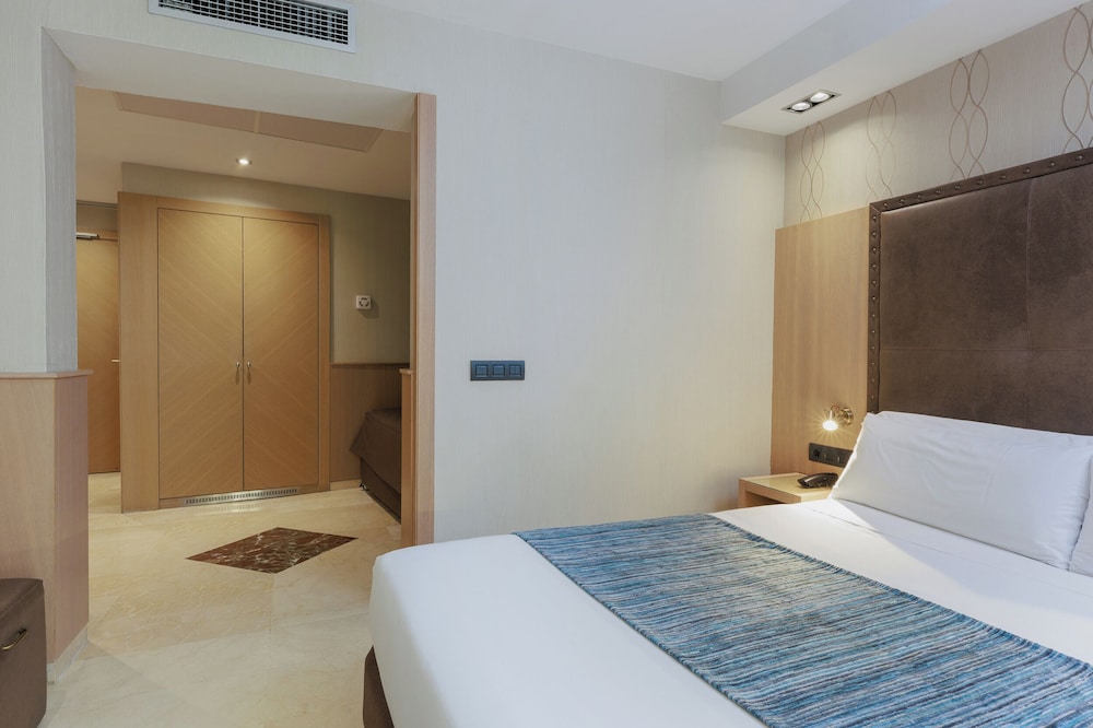 Habitación Triple del hotel Gotico. Foto 6