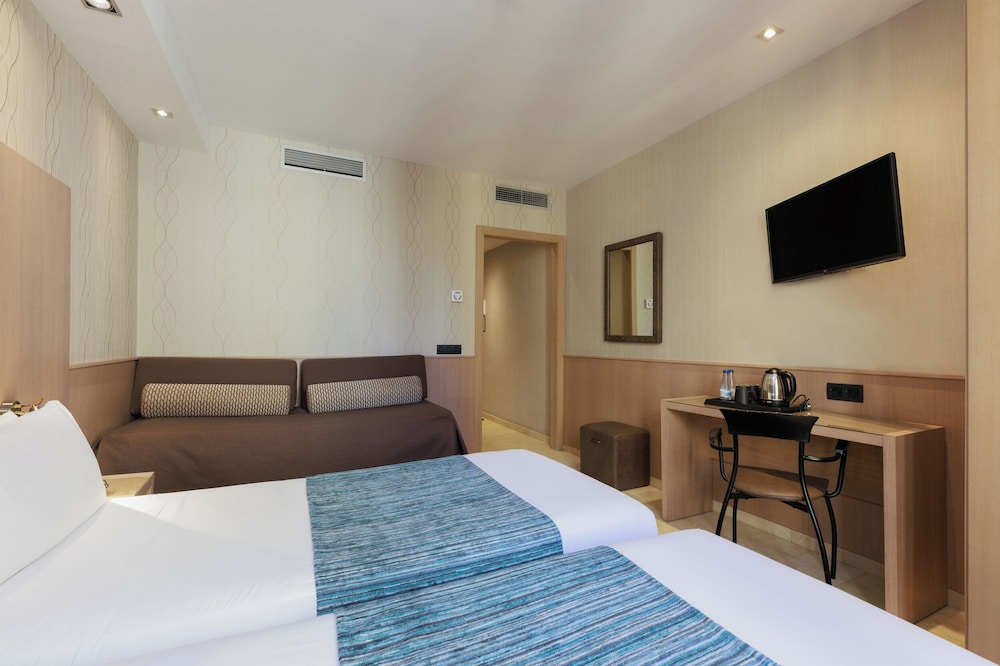 Habitación Triple del hotel Gotico. Foto 11