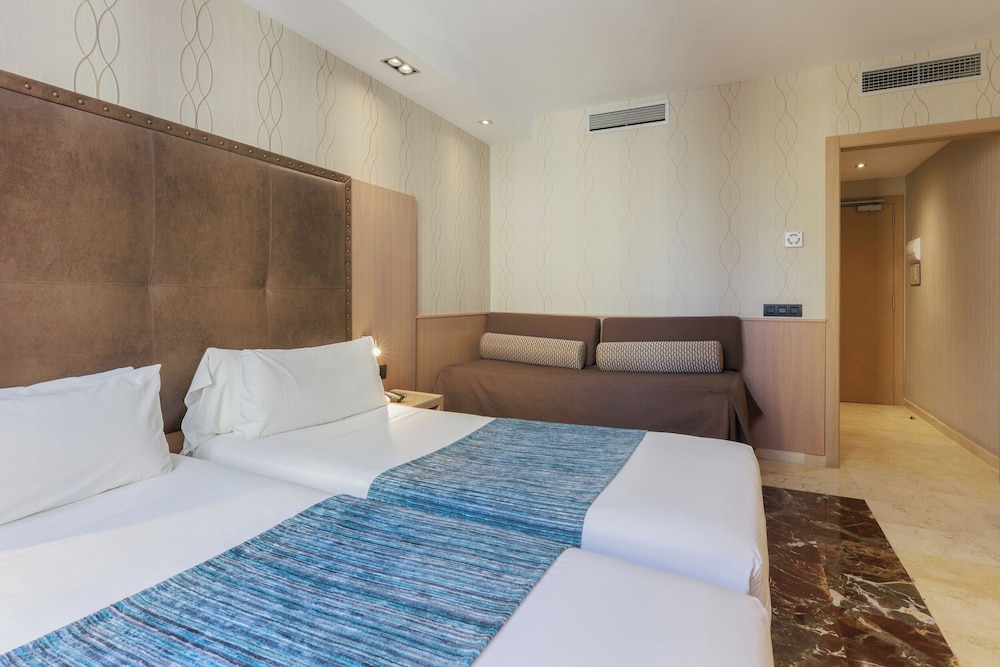 Habitación Triple del hotel Gotico. Foto 12