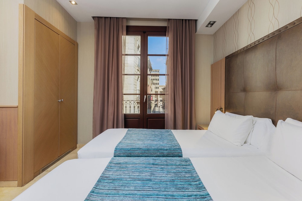 Habitación Triple del hotel Gotico. Foto 13