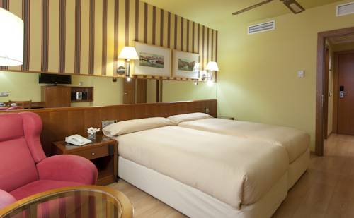 Habitación doble 2 camas del hotel Ilunion Les Corts Spa. Foto 1