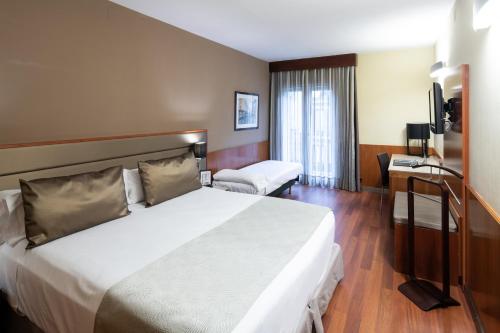 Habitación Triple del hotel Catalonia Diagonal Centro. Foto 4