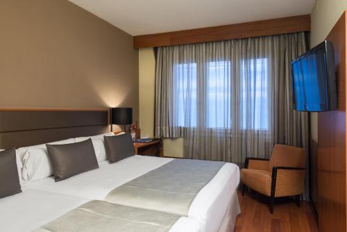 Habitación Familiar del hotel Catalonia Diagonal Centro. Foto 1