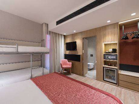 Habitación doble Familiar del hotel Catalonia Eixample 1864. Foto 1