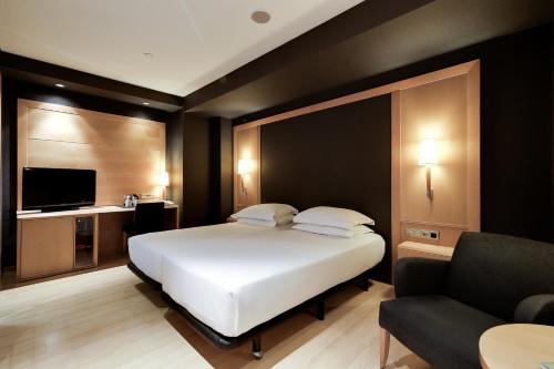 Habitación Doble Estándar - 1 o 2 camas del hotel Barcelona Universal. Foto 2