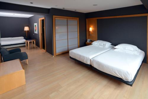 Habitación Triple del hotel Barcelona Universal. Foto 2