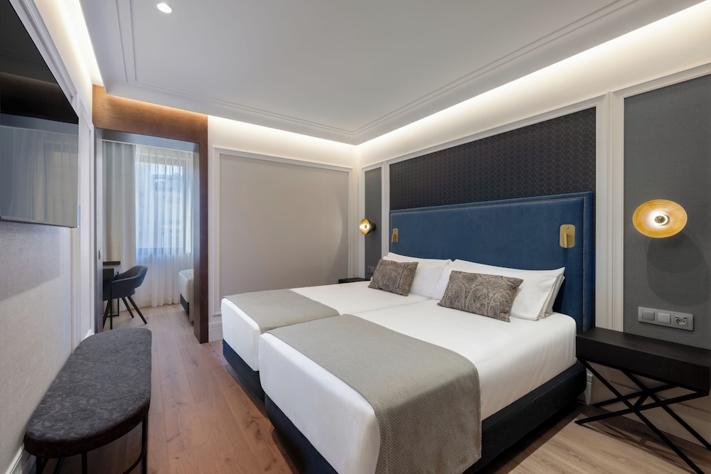 Habitación Triple Premium del hotel Catalonia Plaza Cataluña