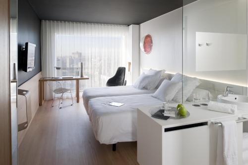 Habitación Doble Deluxe - 1 o 2 camas del hotel Barcelo Sants. Foto 5