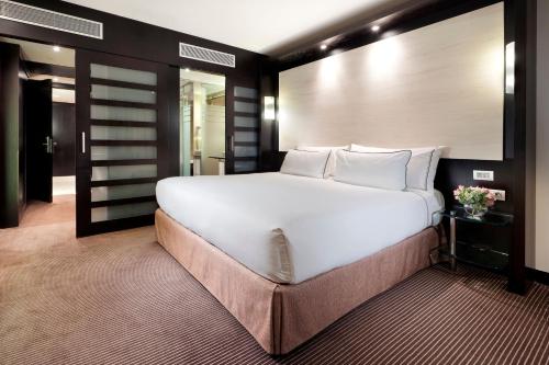 Habitación The Level del hotel Melia Barcelona Sarrià. Foto 1
