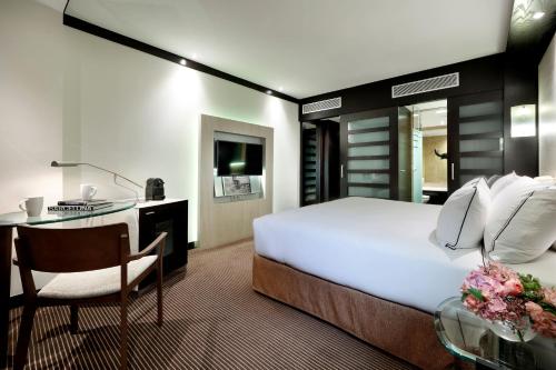 Habitación The Level del hotel Melia Barcelona Sarrià. Foto 2