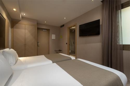 Habitación Doble - 1 o 2 camas del hotel Gran Barcino. Foto 6