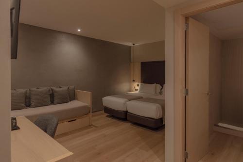 Habitación Triple Superior del hotel Gran Barcino