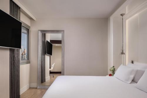 Habitación Individual del hotel NH Collection Barcelona Gran Hotel Calderón. Foto 2