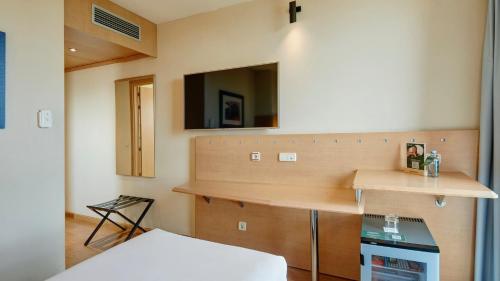 Habitación Individual del hotel Sercotel Porta Barcelona. Foto 3
