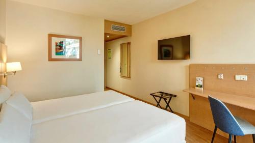 Habitación Doble Estándar - 2 camas del hotel Sercotel Porta Barcelona. Foto 4