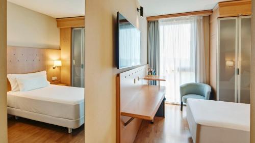 Habitación Individual del hotel Sercotel Porta Barcelona. Foto 2