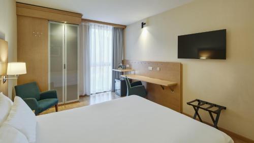 Habitación Doble Estándar del hotel Sercotel Porta Barcelona. Foto 10