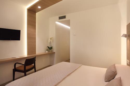 Habitación Cuádruple con terraza del hotel Carlos I