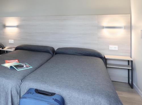 Habitación Triple del hotel Brasil. Foto 4