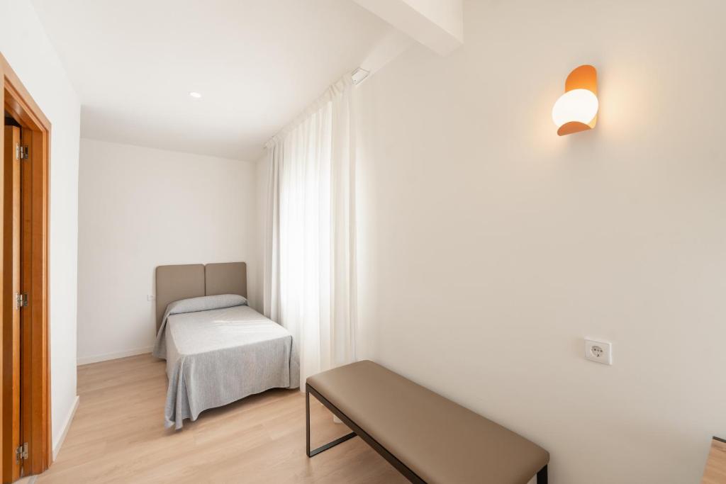 Habitación triple del hotel RH Sol