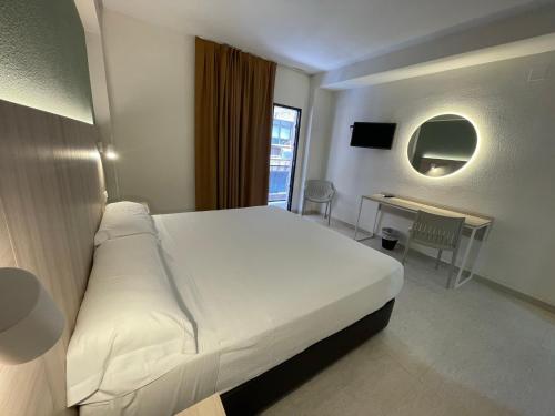 Habitación Doble con balcón - 1 o 2 camas del hotel Marconi. Foto 3