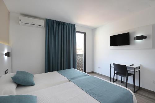 Habitación doble Balcón o Terraza Vista ciudad del hotel Alameda. Foto 5