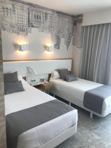 Habitación Doble Premium con terraza del hotel Madeira Centro. Foto 1