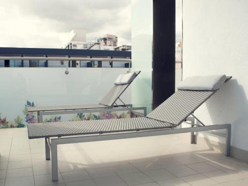 Habitación Doble Deluxe con cama extragrande y vistas a la ciudad del hotel Oasis Plaza. Foto 5