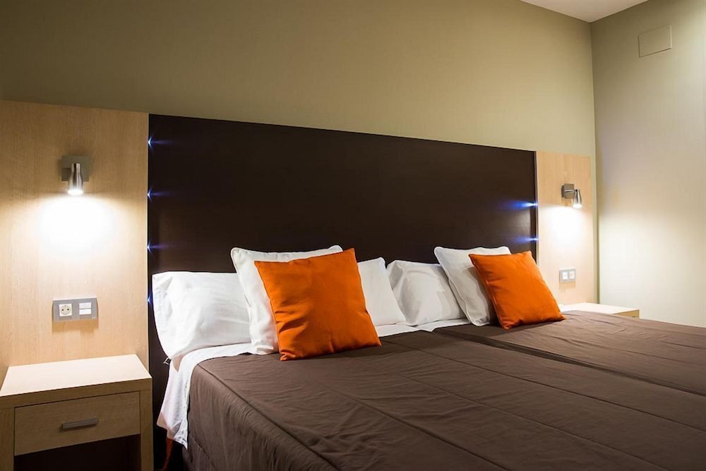 Habitación triple del hotel Melina