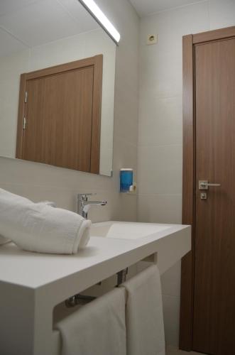 Habitación Triple del hotel Alone. Foto 3