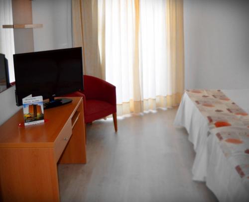 Habitación cuádruple Balcón o Terraza 2 Camas dobles Normal del hotel Alone. Foto 1