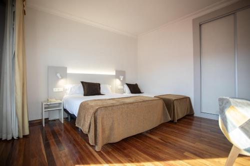 Habitación Doble con cama supletoria - 1 o 2 camas del hotel Tudanca Miranda. Foto 6