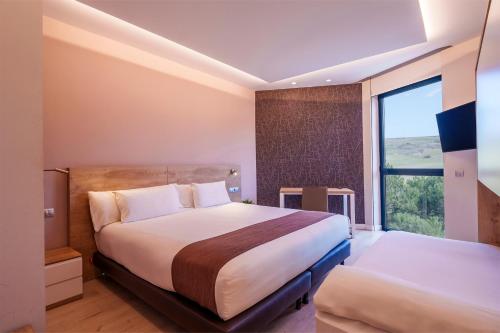 Habitación Triple del hotel Ciudad De Burgos. Foto 1