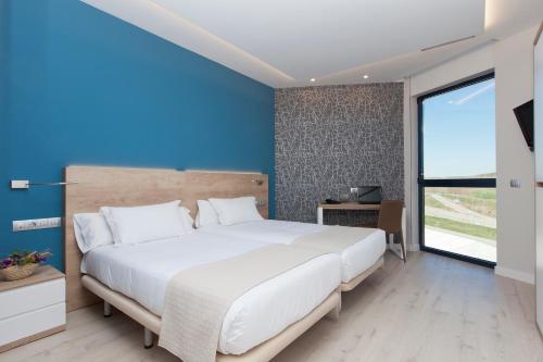 Habitación Doble Deluxe - 1 o 2 camas del hotel Ciudad De Burgos. Foto 5